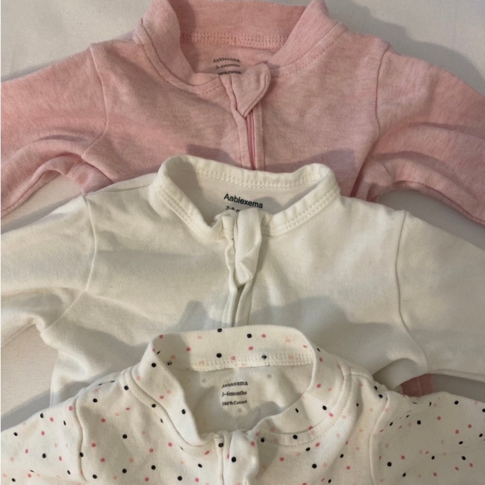 Three Aablexema Footed Pajamas 
100% Cotton
Size 3-6m